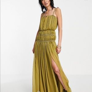 Strappy maxi dress with ruched channel detail and toe straps. Worn once. NWOT.